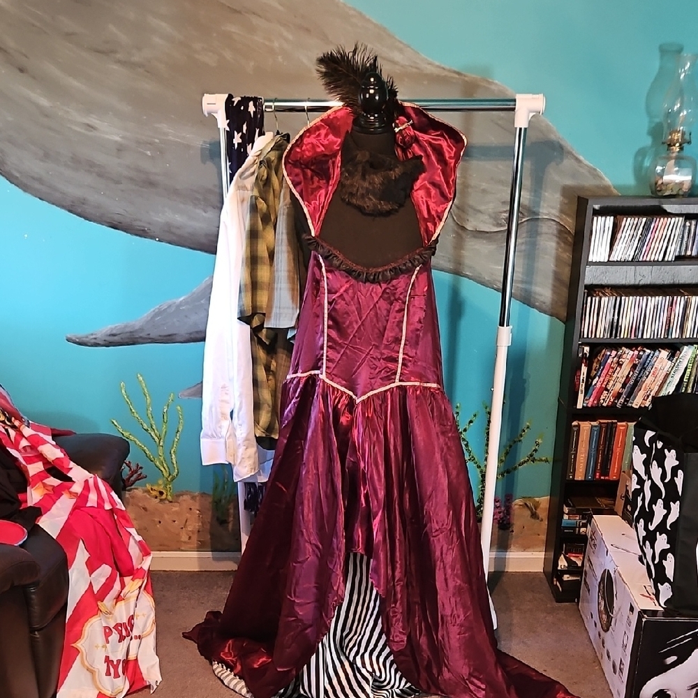 Elegant Burgundy Gown with Feather Detail